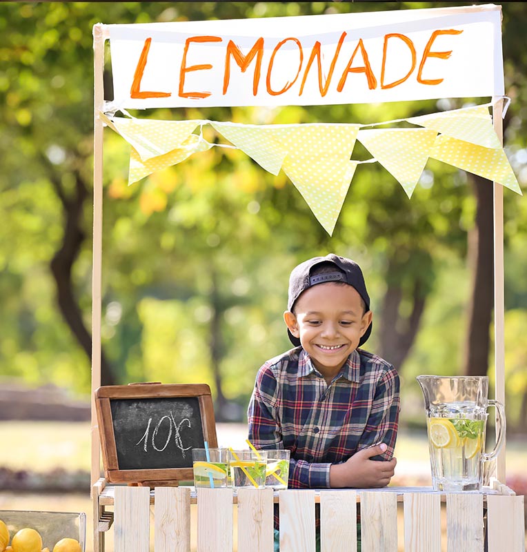 young child and his lemonade stand